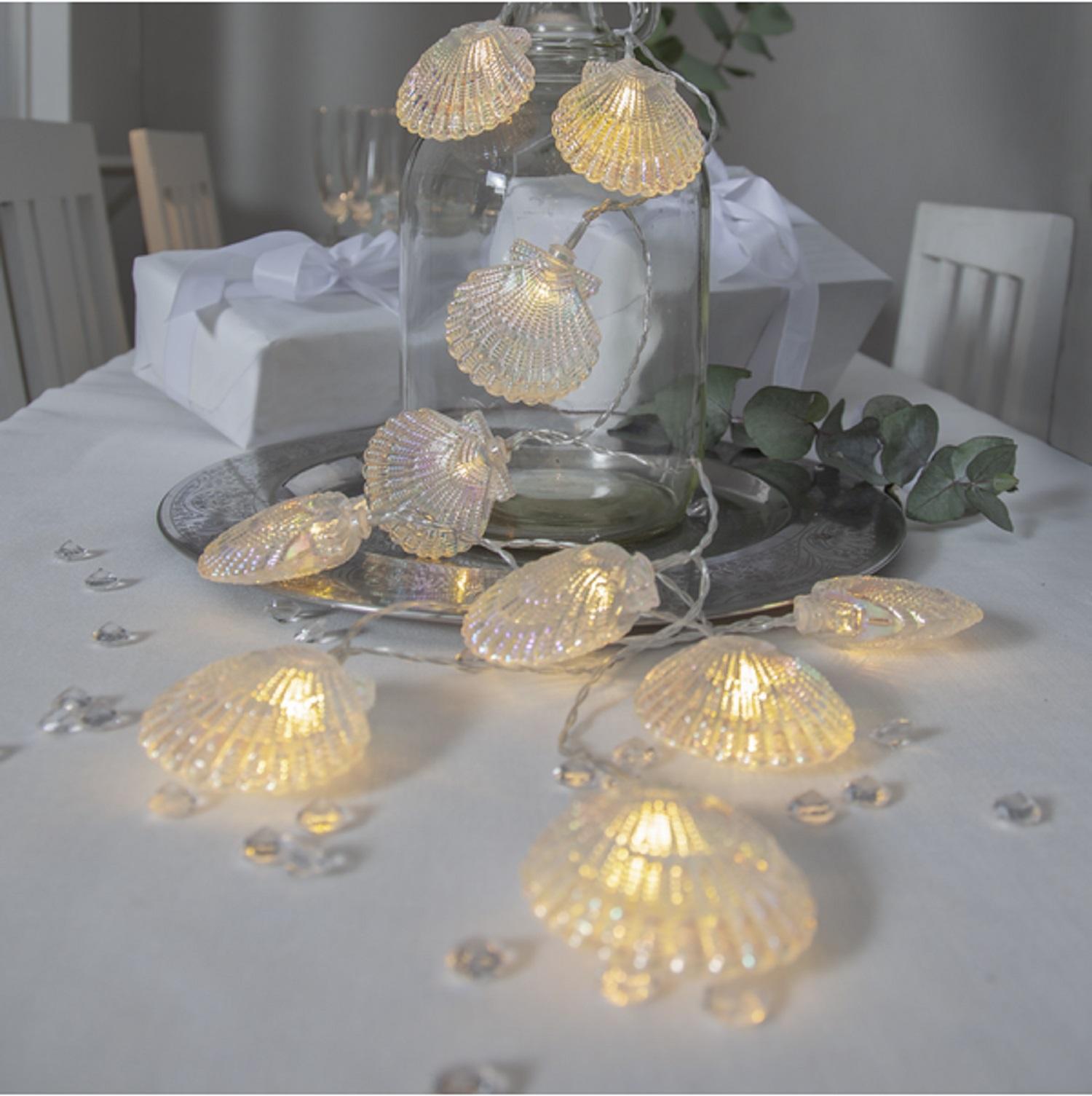 Гирлянда         1,35м теплобелая  Ракушки 5х1,2см на батарейках 3хАА 6ч таймер 10LED indoor